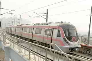 A metro plying on the Pink Line (Mohd Zakir/Hindustan Times via Getty Images)