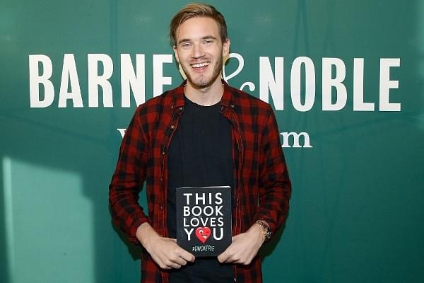 PewDiePie with his book ‘This Book Loves You’  (Photo by John Lamparski/Getty Images)
