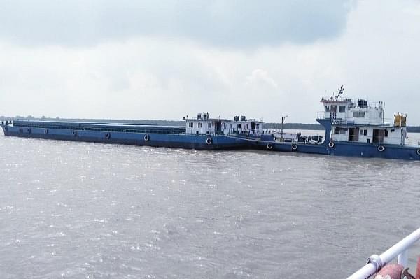 Ship carrying fly ash to Pandu port, Assam (IWAI | Twitter)