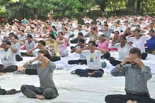 People practising yoga in Varanasi. (Rajesh Kumar/Hindustan Times via GettyImages)&nbsp;