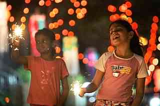 Children lighting crackers on the eve of Diwali festival. (Manoj Patil/Hindustan Times via Getty Images)