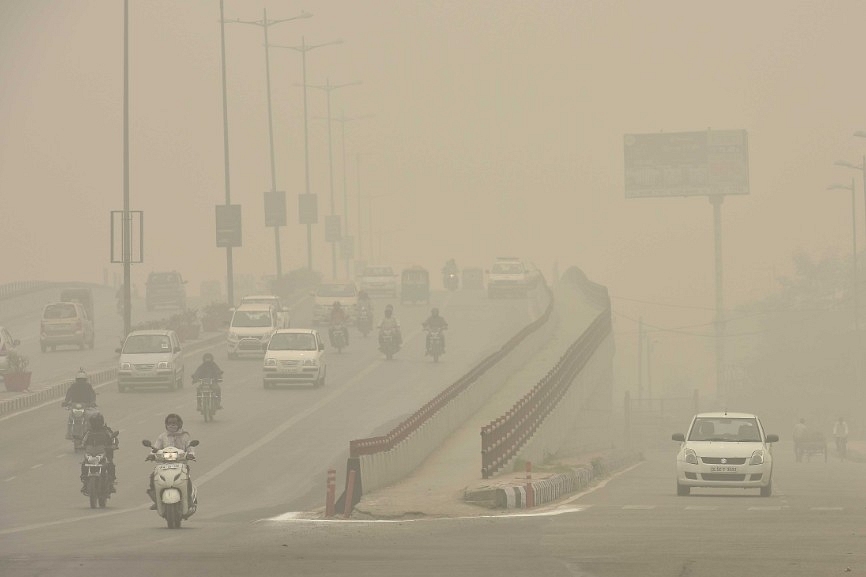 Slow moving traffic due to Smog in Delhi (Raj K Raj/Hindustan Times via GettyImages)