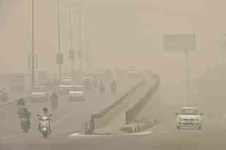 Slow moving traffic due to Smog in Delhi (Raj K Raj/Hindustan Times via GettyImages)