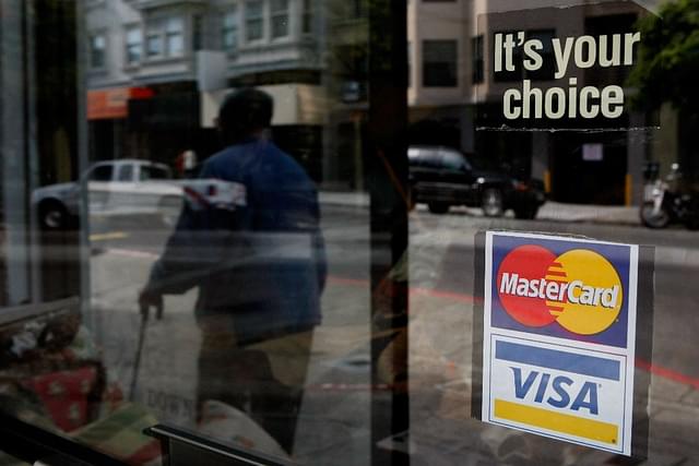 Visa, MasterCard are yet to comply with RBI’s data localisation norms. (Justin Sullivan/Getty Images)