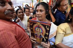 Members of Sabarimala Ayyappa Seva Samajam (SASS) take part in a protest against the Kerala Government  (Biplov Bhuyan/Hindustan Times via Getty Images)