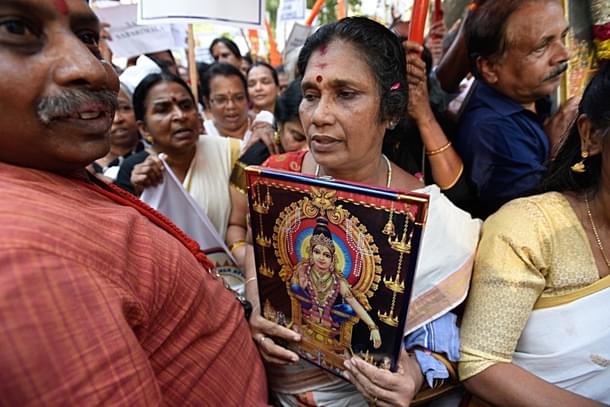 Members of Sabarimala Ayyappa Seva Samajam (SASS) take part in a protest against the Kerala Government  (Biplov Bhuyan/Hindustan Times via Getty Images)