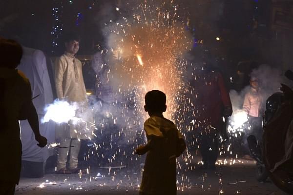 Children playing with fireworks in Delhi (Sonu Mehta/Hindustan Times via Getty Images)