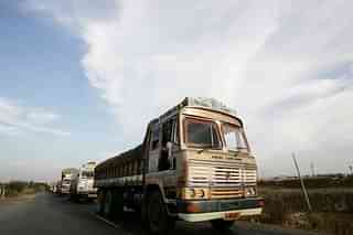 Highway trucks (Vikas Khot/Hindustan Times via Getty Images)