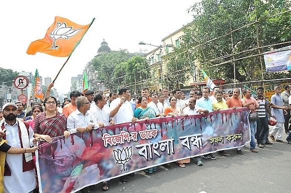 Bharatiya Janata Party (BJP) workers participate in a rally during a 12 hour long statewide strike ‘Bengal Strike’ (Photo by Debajyoti Chakraborty/NurPhoto via Getty Images)