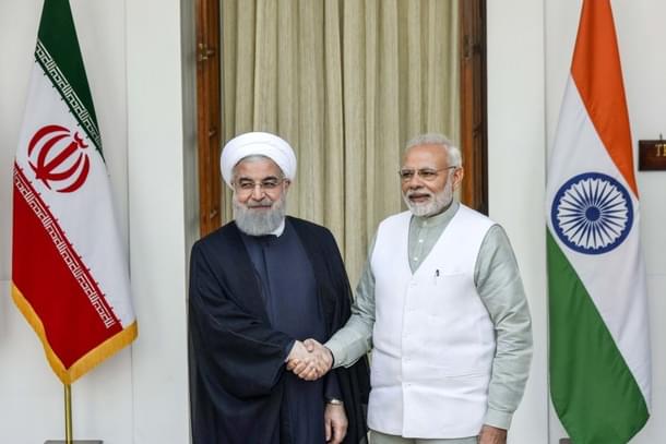 Iran President Dr. Hassan Rouhani shakes hands with PM Narendra Modi. (Vipin Kumar/Hindustan Times via Getty Images)