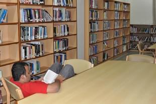 Student reading inside library of Indian Institute of Management Lucknow (IIM - L) (Ashok Dutta/Hindustan Times)