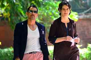 Robert Vadra with his wife Priyanka Gandhi Vadra. (Priyanka Parashar/Mint via Getty Images)