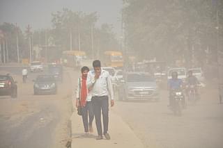A view of Lal Kuan area engulfed in dust near NH24 on 30 October in Ghaziabad (Sakib Ali/Hindustan Times via Getty Images)