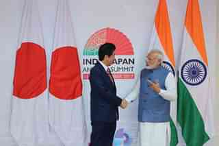 Indian Prime Minister Narendra Modi shakes hand with Japanese Prime Minister Shinzo Abe (Photo by Siddharaj Solanki/ Hindustan Times via Getty Images)