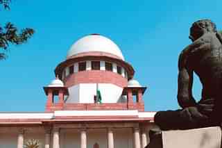 Who, if anyone, is accountable for the massive costs imposed by the judiciary? (Narendra Bisht/The India Today Group/Getty Images)