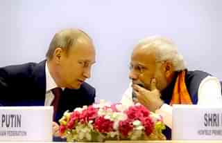 Indian Prime Minister Narendra Modi talking with Russian President Vladimir Putin. (Sushil Kumar/Hindustan Times via Getty Images)&nbsp;