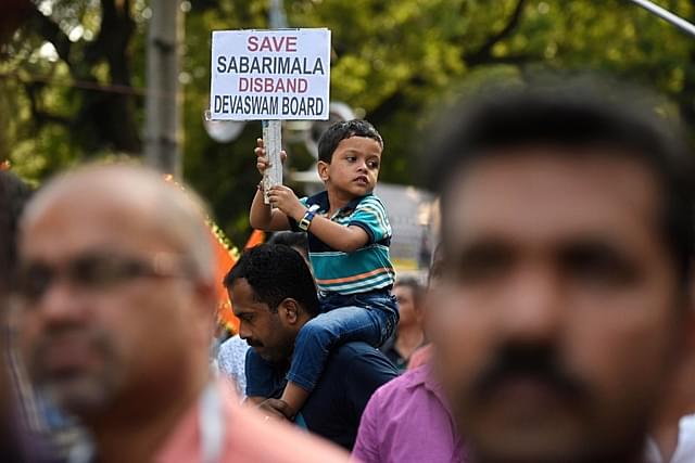 Members of Sabarimala Ayyappa Seva Samajam (SASS) take part in a protest against the Supreme Court verdict on the entry of women of all ages into the Sabarimala Lord Ayyappa Temple (Biplov Bhuyan/Hindustan Times via Getty Images)