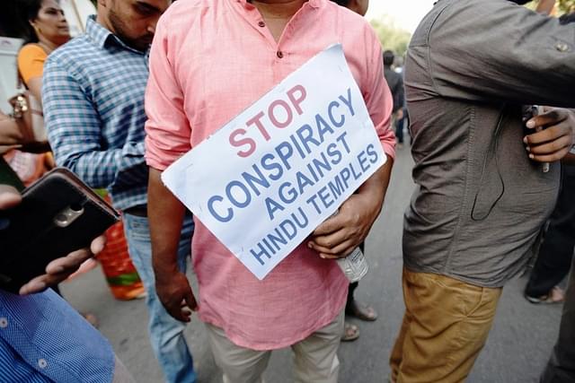 Members of Sabarimala Ayyappa Seva Samajam (SASS) take part in a protest. (Biplov Bhuyan/Hindustan Times via Getty Images)