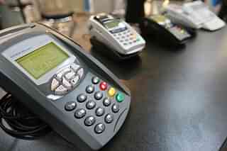 Card payment terminals are on display digital IT and telecommunications fair (JOHN MACDOUGALL/AFP/GettyImages)