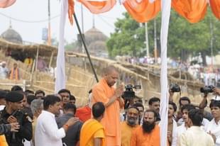 Uttar Pradesh Chief Minister Yogi Adityanath performing arti at Saryu River ghat (Photo by Deepak Gupta/Hindustan Times via Getty Images) 