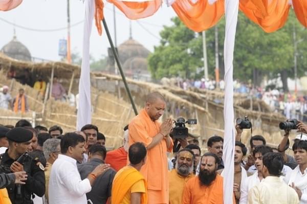 Uttar Pradesh Chief Minister Yogi Adityanath performing arti at Saryu River ghat (Photo by Deepak Gupta/Hindustan Times via Getty Images) 