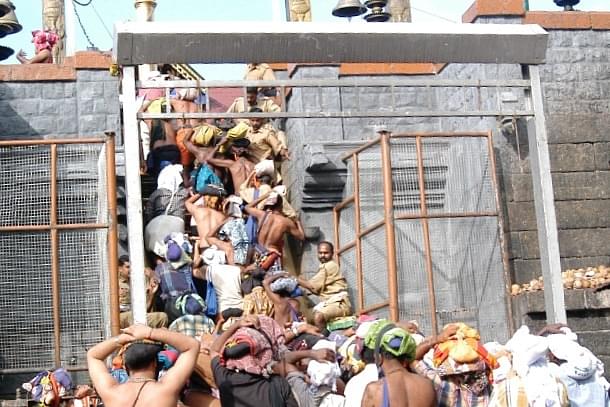 Devotees thronging the temple, Lord Ayyappa of Sabarimala in Kerala, India (Photo by Shankar/The India Today Group/Getty Images)