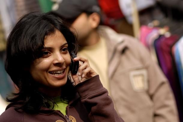 A woman talks on cell phone (Pradeep Gaur/Mint via Gettyimages)  