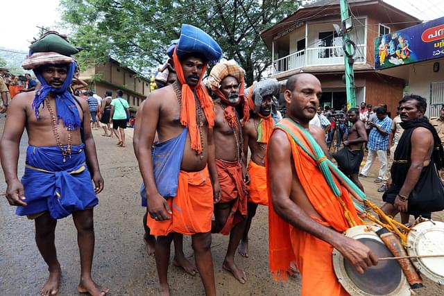People seen at Pamba base camp of Sabarimala Temple (Vivek R Nair/Hindustan Times via Getty Images)