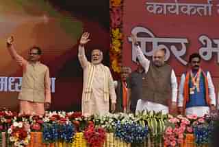  Prime Minister Narendra Modi along with BJP President Amit Shah and Madhya Pradesh Chief Minister Shivraj Singh Chouhan during the BJP party workers conclave called ‘Kar-yakarta Mahakumbh’, at Jamboree Ground, on  25 September 2018 in Bhopal (Mujeeb Faruqui/Hindustan Times via Getty Images)