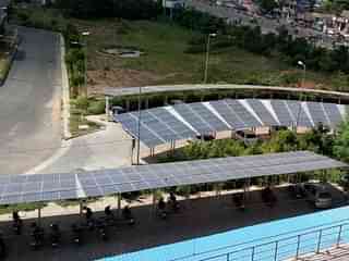 Solar panels atop car parking sheds at Chennai Metro’s administrative office in Koyambedu.