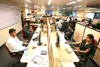 Tutors work at TutorVista headquarters in Bangalore, India. (Photo by Uriel Sinai/Getty Images)&nbsp;