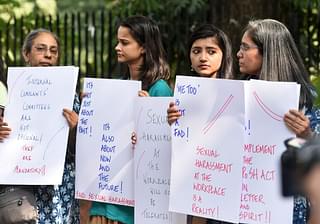 Women hold placards against sexual harassment in workspaces. (Representative image) (Mohd Zakir/Hindustan Times via Getty Images)