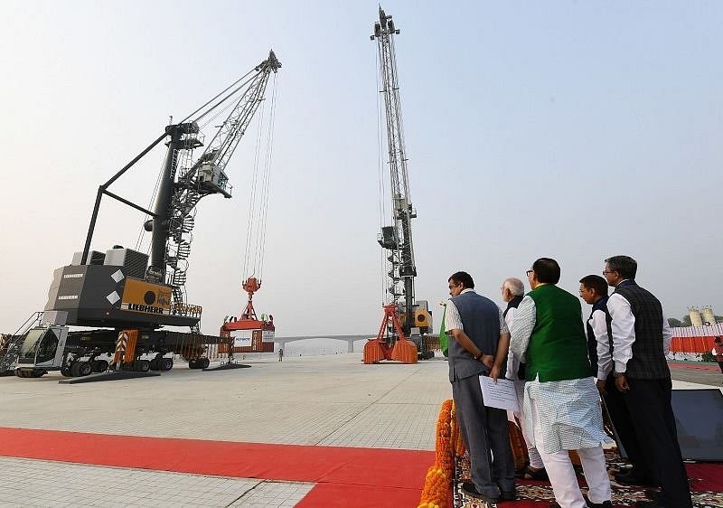 Prime Minister Narendra Modi dedicates India’s First Multi-Modal Terminal on river Ganga to the nation, in Varanasi. (Image: Ananthan via Facebook)