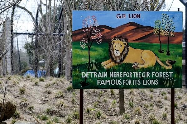 A signboard in a Gir Lion’s enclosure at the London Zoo. (Photo by Chris Ratcliffe/Getty Images)