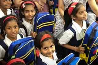 The girl students getting schoolbags from 3M management (Debari Sen/via Twitter)