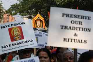 Members of Navi Mumbai Malayali Samaj protest against Supreme Court verdict of allowing women to enter Sabarimala Temple in Kerala. (Bachchan Kumar/Hindustan Times via GettyImages)&nbsp;