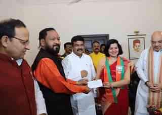 Aparajita Sarangi inducted into the BJP. (dpradhanbjp/Twitter.com)
