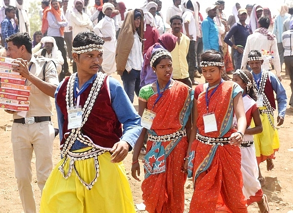 Tribals going to attend Prime Minister Narendra Modi`s meeting during the occasion of National Panchayati Raj Day (Photo by Mujeeb Faruqui/Hindustan Times via Getty Images)