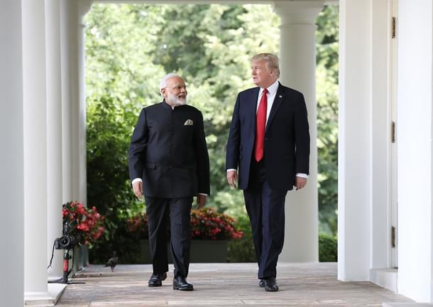 US President Donald Trump and Indian Prime Minister Narendra Modi walk from the Oval Office to deliver joint statements in the White House. (Win McNamee/Getty Images) 