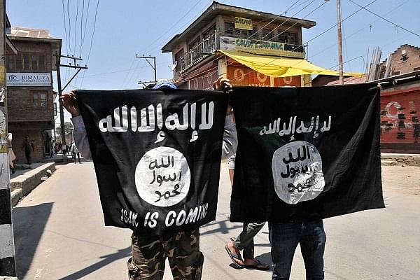 ISIS flags being displayed in Kashmir (Waseem Andrabi/Hindustan Times via Getty Images)