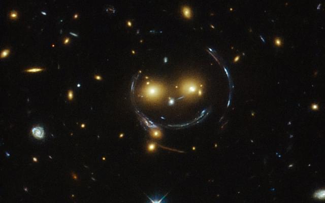 Galaxy cluster SDSS J1038+4849 with its smiley face in space. (Pic: @NASA/twitter)