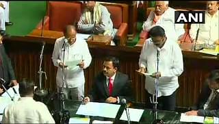 Congress MLAs Anand Singh and Pratap Gowda Patil take oath as an MLA in Karnataka’s Vidhana Soudha. (Image courtesy of twitter.com/ANI)