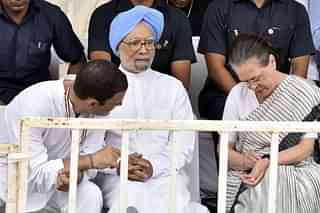 Rahul Gandhi, Manmohan Singh and Sonia Gandhi (Sonu Mehta/Hindustan Times via Getty Images)