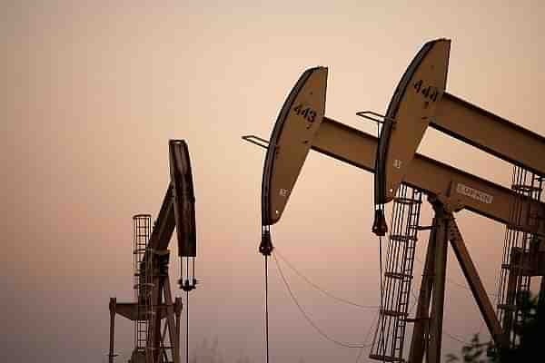 Oil rigs extracting petroleum (David McNew/Getty Images)