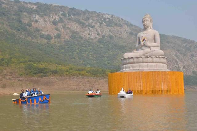 Chief Minister Nitish Kumar Encircling Lord Buddha Statue On A Boat ( Photo via Twitter)