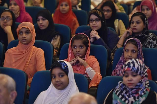 Muslim students listening to Finance Minister Arun Jaitley’s first memorial lecture on Dr. A.P.J. Abdul Kalam at India Islamic Cultural Centre, Lodhi Road (Photo by Raj K Raj/Hindustan Times via Getty Images)