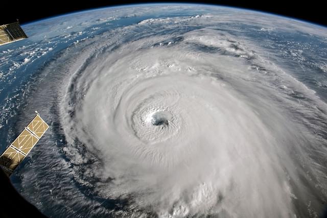  In this NASA handout image taken from aboard the International Space Station, shows Hurricane Florence as it travels west in the Atlantic Ocean off the coast of the U.S. on 12 September 2018. (Photo by NASA via Getty Images)
