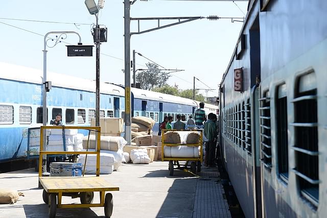 A Passenger looking from window of train at Bangalore railway station, on February 24, 2015 in Bengaluru, India. (Hemant Mishra/Mint via Getty Images)