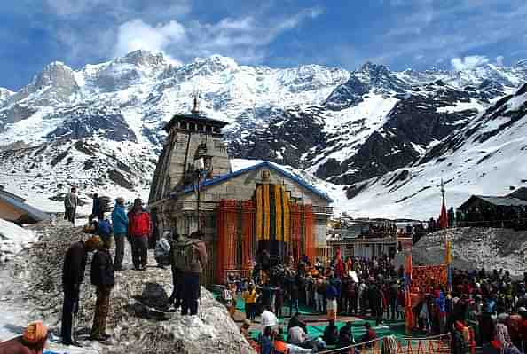 Char Dham pilgrims awaiting their turn to pray at the Kedarnath temple. (Vinay Santosh Kumar/Hindustan Times via Getty Images)