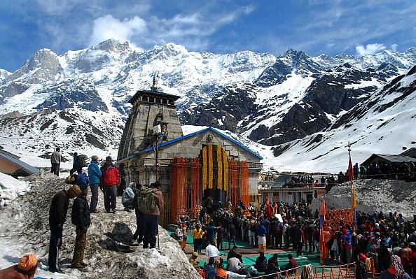 Char Dham pilgrims awaiting their turn to pray at the Kedarnath temple. (Vinay Santosh Kumar/Hindustan Times via Getty Images)